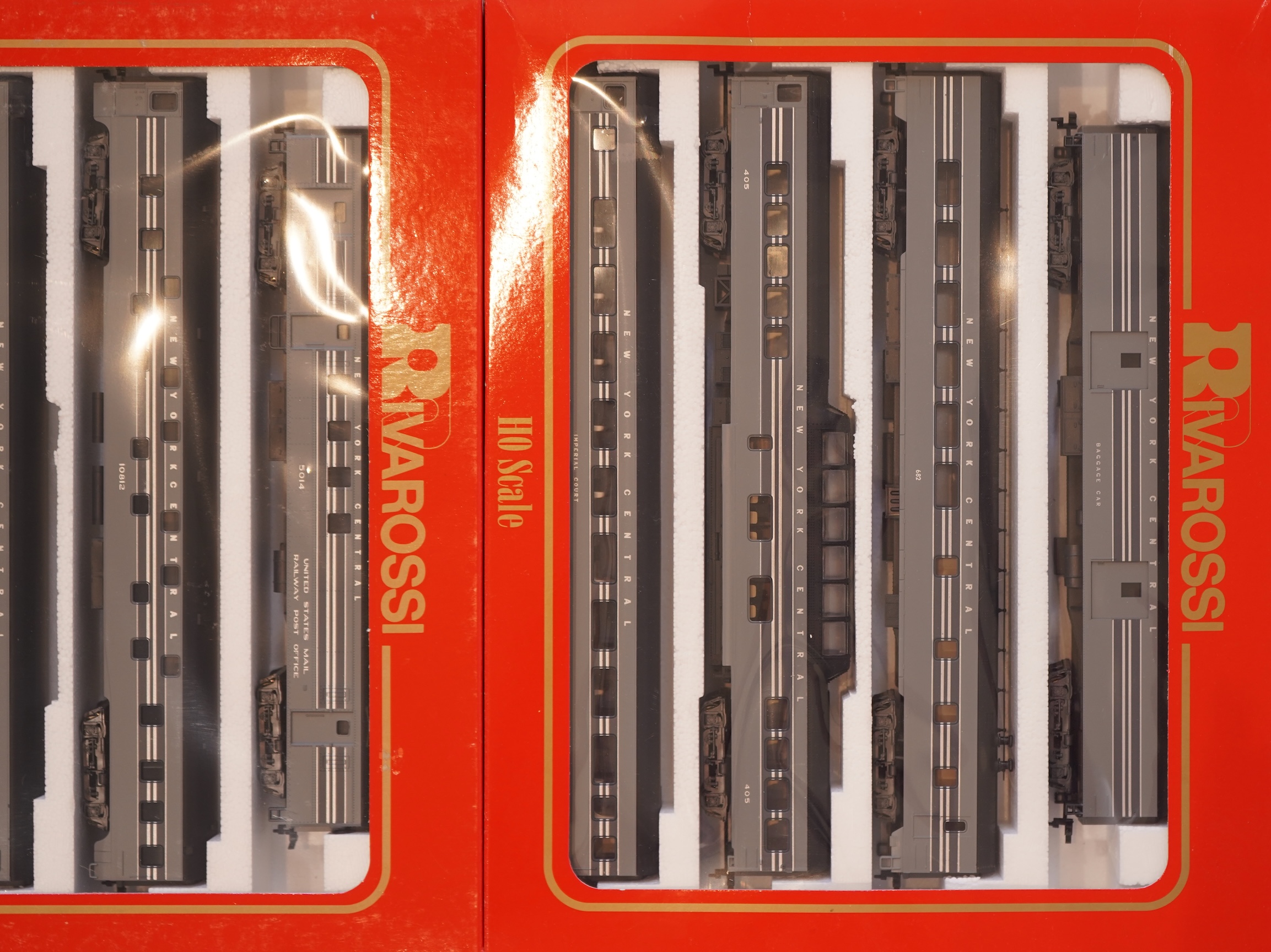 Two boxed Rivarossi 1930s New York Central Railroad coach packs; A Set (6946) and B Set (6947), both containing four coaches